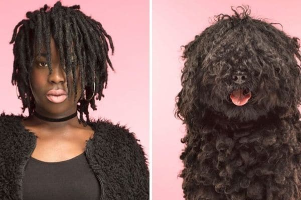 black-woman-with-dark-hair-next-to-black-haired-dog